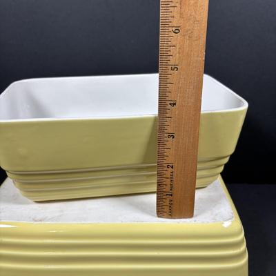 LOT 261: Hall for Westing House Refrigerator Dishes (no lids), Brown Glaze Bowl USA, Shawnee Cat Creamer, National Dairy Orange Juice...