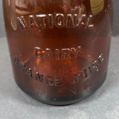 LOT 261: Hall for Westing House Refrigerator Dishes (no lids), Brown Glaze Bowl USA, Shawnee Cat Creamer, National Dairy Orange Juice...