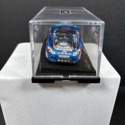 LOT 262: NASCAR Collectibles: Signed Ken Schrader & Buckshot Jones Die Cast Cars NIP, Lee Petty NIP 1949 Plymouth Die Cast