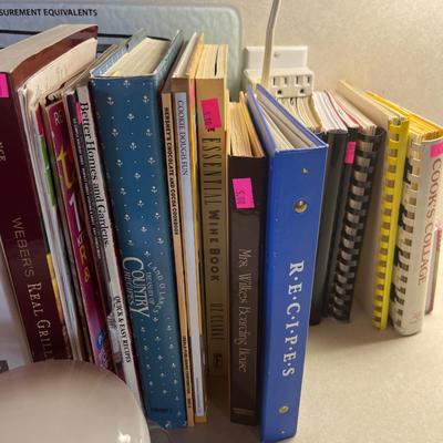 Sale Photo Thumbnail #232: Cookbooks, Pan, utensils, And more.