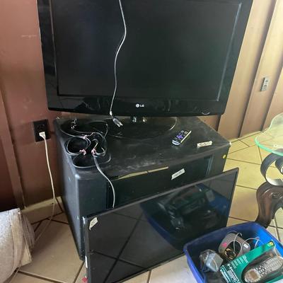 Sale Photo Thumbnail #259: Two TVs and Stand.