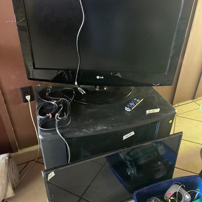 Sale Photo Thumbnail #260: Two TVs and Stand.