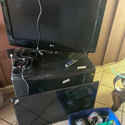 Sale Photo Thumbnail #256: Two TVs and Stand.