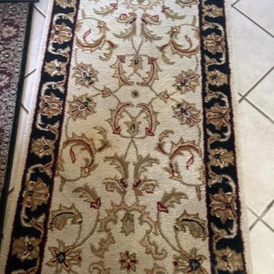 Sale Photo Thumbnail #264: Three Rugs and under rug Grip.