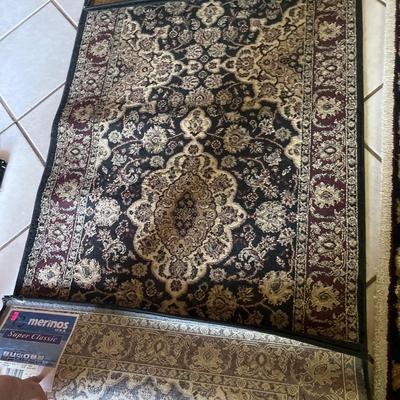 Sale Photo Thumbnail #265: Three Rugs and under rug Grip.