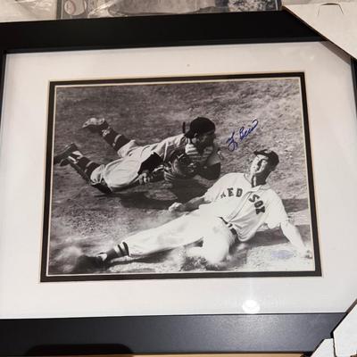 Autographed Yogi Berra photo in action