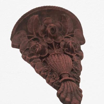 Carved wall shelf