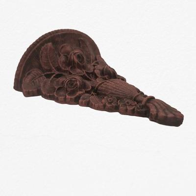 Carved wall shelf