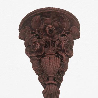 Carved wall shelf