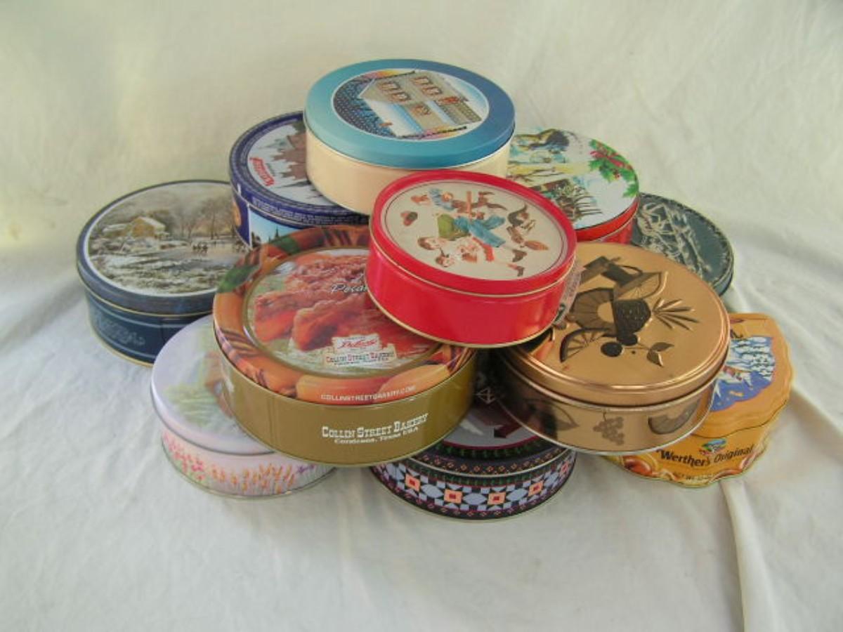 A DOZEN assorted tins, various sizes in a box | EstateSales.org