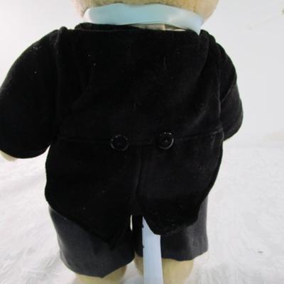 Bear in a tuxedo with stand