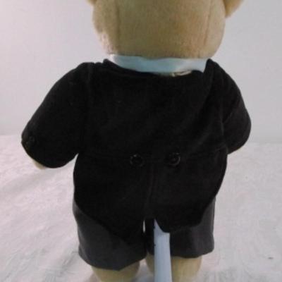 Bear in a tuxedo with stand
