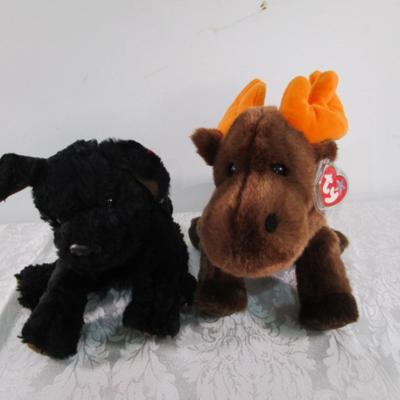 3 Ty stuffed animals, 1 stuffed lizard, 1 raccoon hat with gloved ends