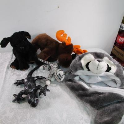 3 Ty stuffed animals, 1 stuffed lizard, 1 raccoon hat with gloved ends