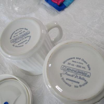 6 containers, various sizes, most with lids
