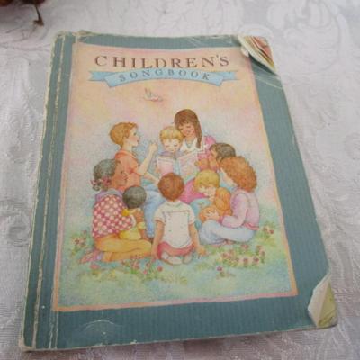 7 Hymn books (one in Spanish), one Children's song book