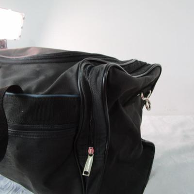 2 Ascot bags with luggage tags, feet, and shoulder straps