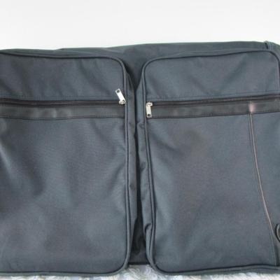 American Tourister garment bag with luggage tag