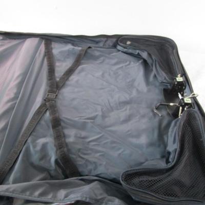 American Tourister garment bag with luggage tag