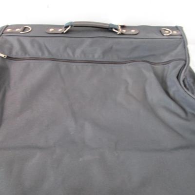 American Tourister garment bag with luggage tag