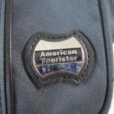 American Tourister garment bag with luggage tag