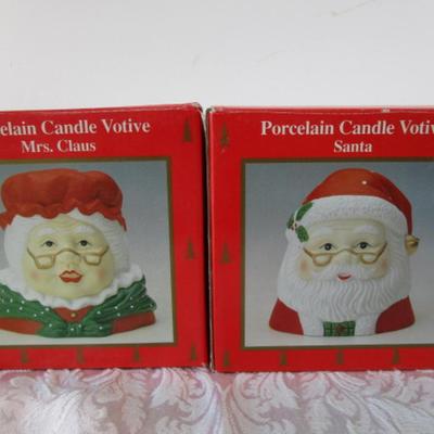 New in box, Mr. & Mrs. Santa porcelain candle holders