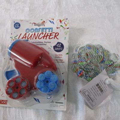 New bag of marbles, New in pkg Confetti launcher