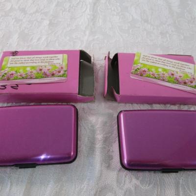 New in box 2 pink metal wallets