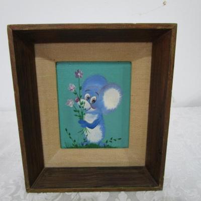Framed painting of a mouse