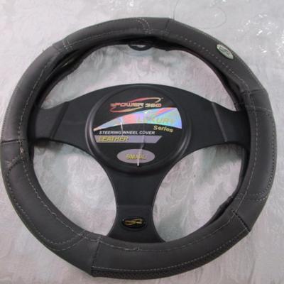 New in package. E Power 360 Steering Wheel cover, small