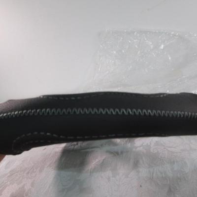 New in package. E Power 360 Steering Wheel cover, small