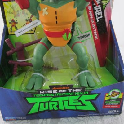 New in pkg, Teenage Mutant Ninja Turtles Raphael, flips & yells