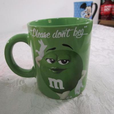 2 M&M mugs, red & green
