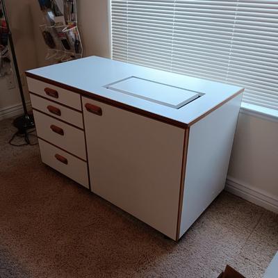 SEWING MACHINE CABINET ON CASTERS WITH VARIOUS NOTIONS