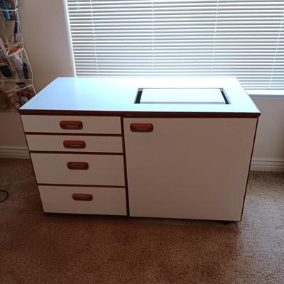 SEWING MACHINE CABINET ON CASTERS WITH VARIOUS NOTIONS