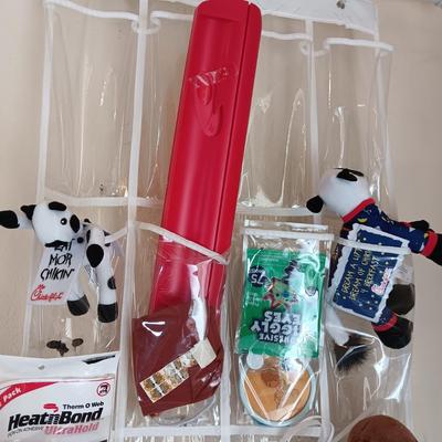 HANGING ORGANIZER FULL OF CRAFT AND SEWING SUPPLIES