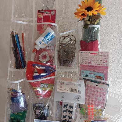 HANGING ORGANIZER FULL OF CRAFT AND SEWING SUPPLIES