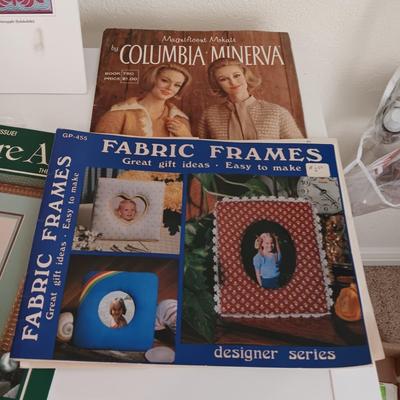 AN ASSORTMENT OF SEWING PATTERNS AND INSTRUCTION BOOKS