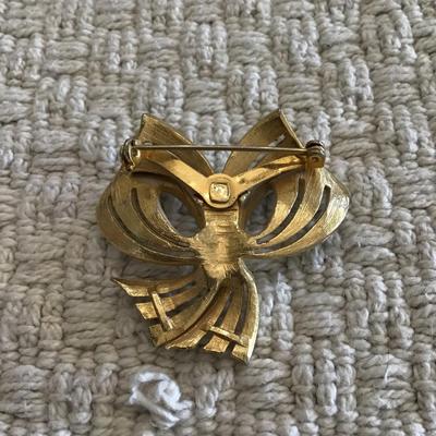 Vintage gold tone white enamel ribbon bow brooch