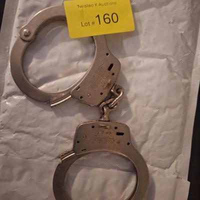 Sale Photo Thumbnail #432: these are real police handcufs they were engraved VWPD there are no keys for them