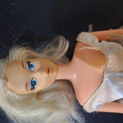 Sale Photo Thumbnail #446: her crown is missing and the suit is ripped on the rear.