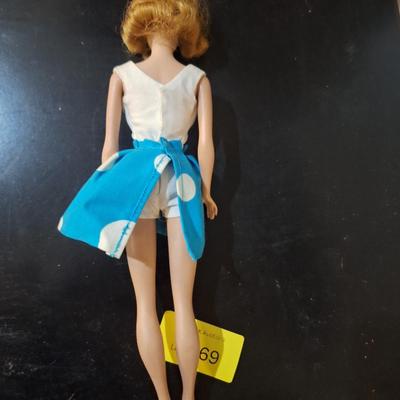 Sale Photo Thumbnail #452: we think this was the first Midge released.  Notice the stamp on her rear, painted fingernails, blue eyes, curved eyebrows.  We are not barbie experts.  Please see photos.