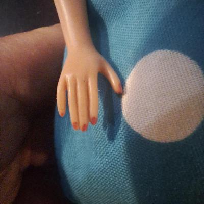 Sale Photo Thumbnail #453: we think this was the first Midge released.  Notice the stamp on her rear, painted fingernails, blue eyes, curved eyebrows.  We are not barbie experts.  Please see photos.