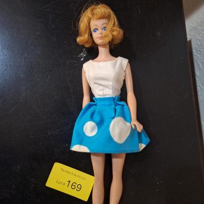 Sale Photo Thumbnail #450: we think this was the first Midge released.  Notice the stamp on her rear, painted fingernails, blue eyes, curved eyebrows.  We are not barbie experts.  Please see photos.