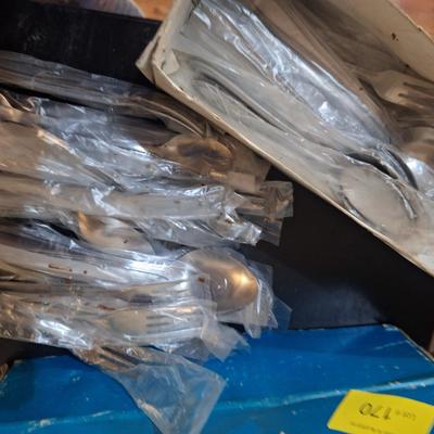 Sale Photo Thumbnail #463: looks to be an entire set but we did not confirm it.  There is something on some of the plastic protective sleeves like something was spilled but has dried up, the flatware inside are all clean.