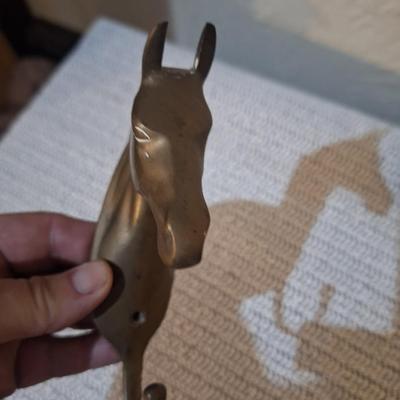 Sale Photo Thumbnail #529: Brass horse head hook