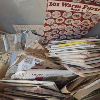 Sale Photo Thumbnail #581: there are other items in there also like a crafting booklet or two.  Some patterns are cut and there may  be some that are uncut.  Look at it this way…the same tub with lid at a store would be more than $10 so….you're getting that plus some possible g