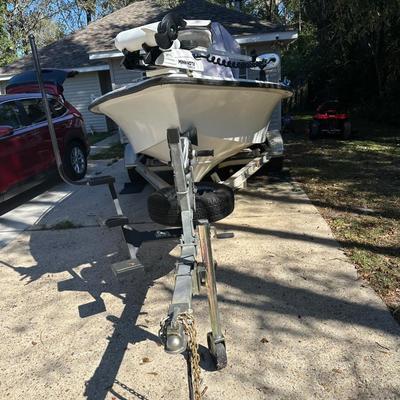 Sale Photo Thumbnail #3: 2003 Blazer Bay 18.5 foot fiber glass boat with 115 hp Yamaha 2 stroke engine with oil reservoir and new 2023 Minn Kota Terrova Trolling motor and starline drive on aluminum trailer. All in good working order.