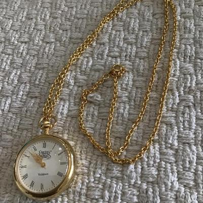 Gold tone precious moments pocket watch