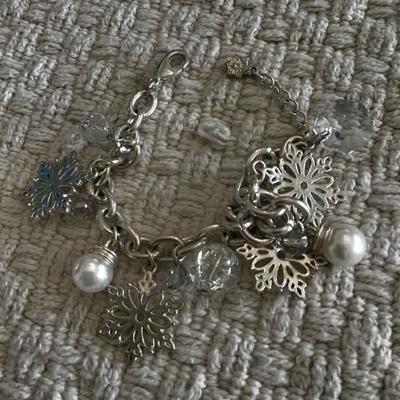 Avon silver tone snowflake charm bracelet
